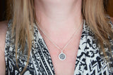 Handwriting and Fingerprint on a Bordered Circle Shaped Silver Pendant