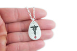 Tear Drop Silver Medical Alert Pendant with Information on the Back