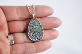 Fingerprint on a Silver Teardrop Shape Pendant
