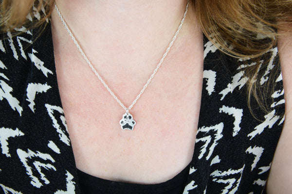 Paw-Print Necklace with Diamond Accents in Sterling Silver. 16