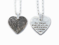 2 Fingerprints on a Silver Heart Shape Pendant
